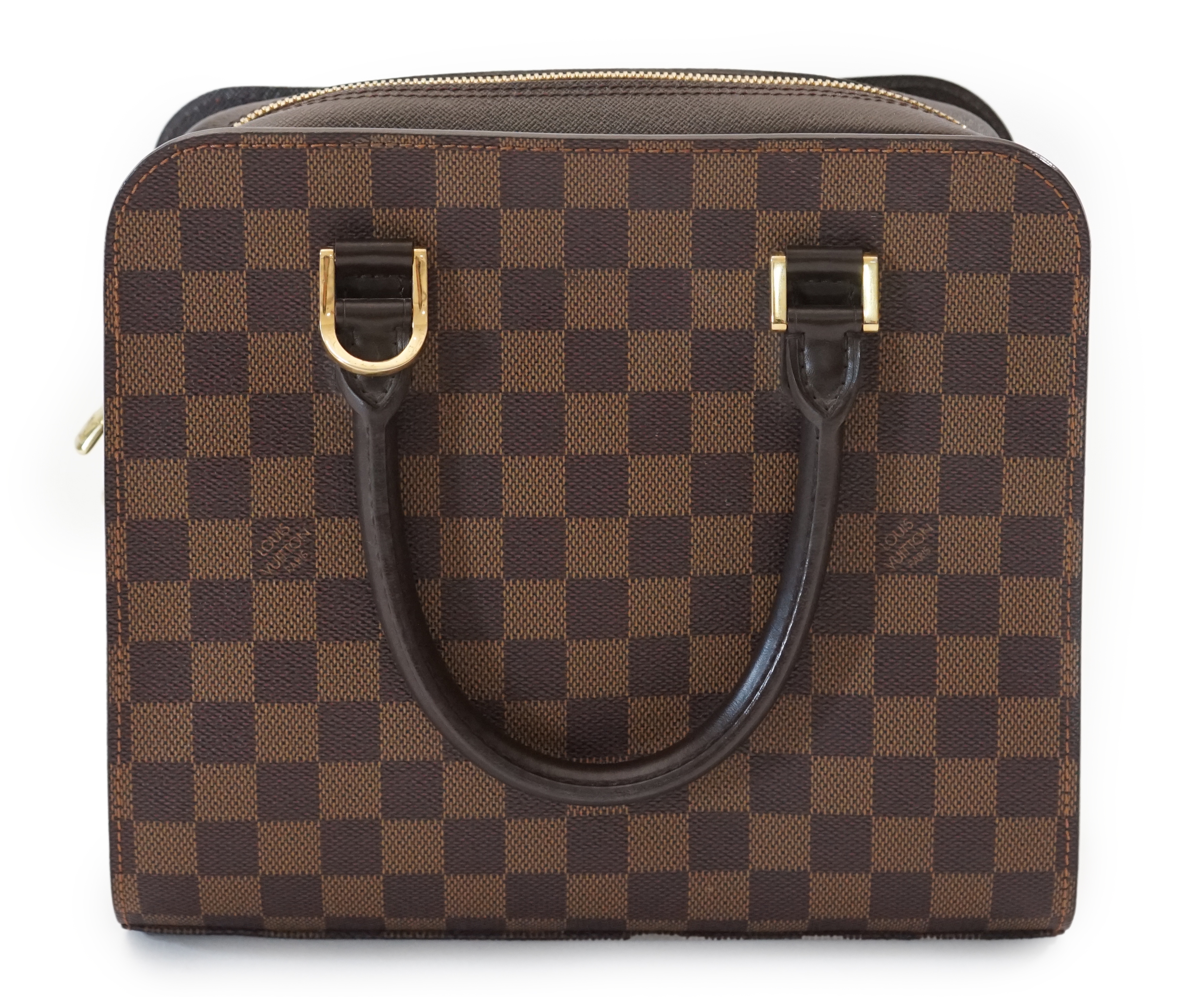 A Louis Vuitton Triana handbag, styled in Damier canvas width 26cm, depth 12cm, height 22cm handle 11cm